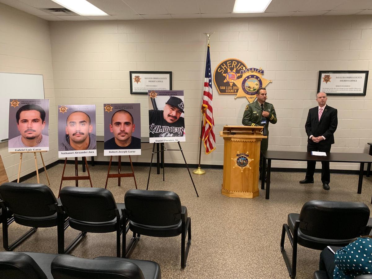 Sheriff Ian Parkinson and District Attorney Dan Dow lead a news conference Monday announcing the arrest of three suspects in the death of Oceano resident Daniel Fuentes Sr., center. The suspects are, from left, Gabriel Luis Garay, 21, Nathaniel Alexander Jara, 21, and Robert Joseph Garay, 28.