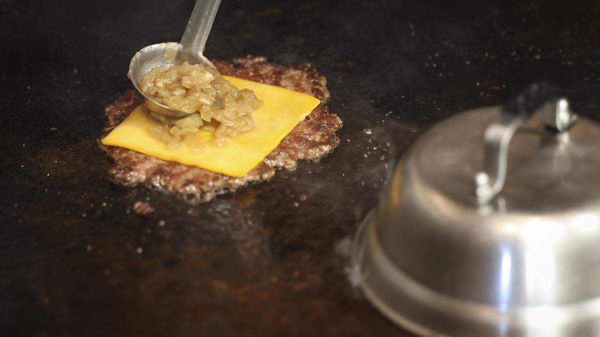 Grilled onion is an option. Mosey's Burgers on Main St. in Morro Bay offers smashburgers, seasoned fries and onion rings, seen here on Jan. 28, 2026. 