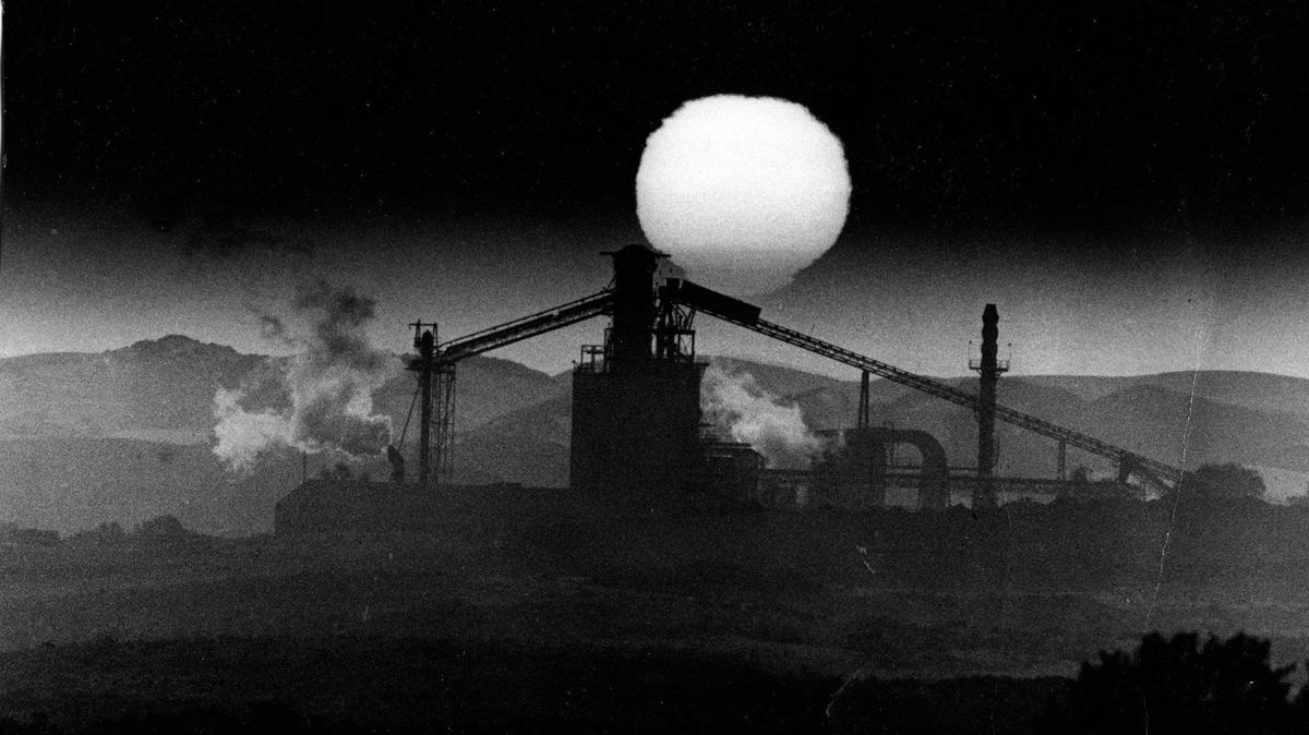 Sun sets behind the chemical division plant next to the oil refinery then owned by Union Oil in 1987. Steam rises used to provide heat needed in processing.