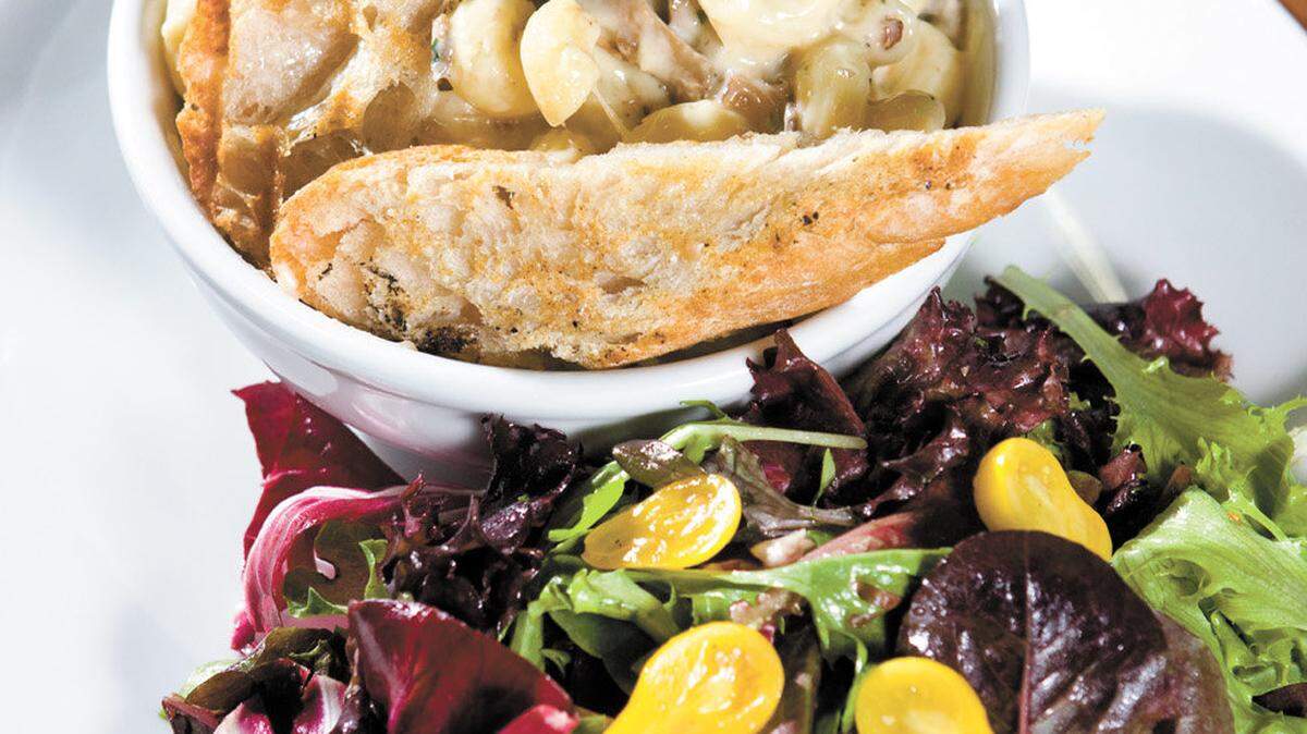 Dolce Galleria's Favalosa macaroni and cheese features a multi-cheese blend, bacon, onions, wild mushrooms and bechamel sauce, and is served with a green salad.
