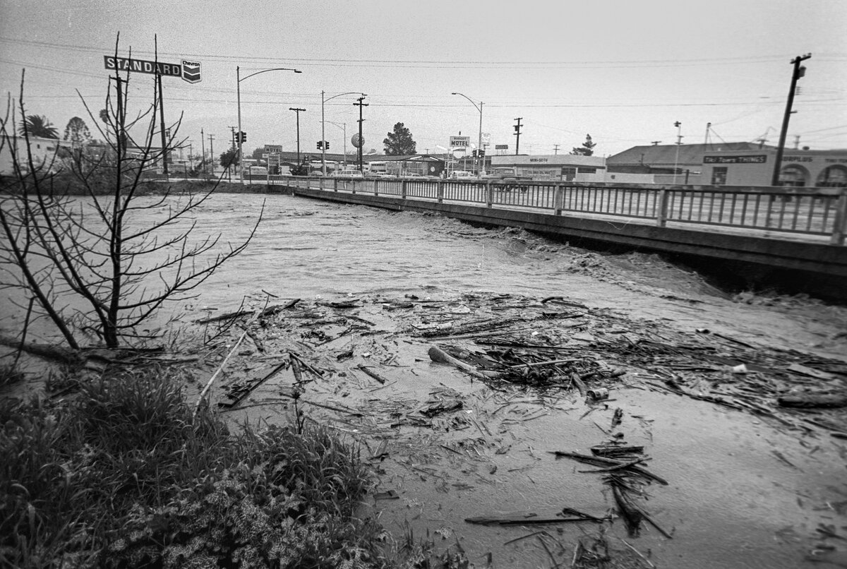 Floodwaters of San Luis Creek are at the deck of the Marsh Street bridge in January 1973.