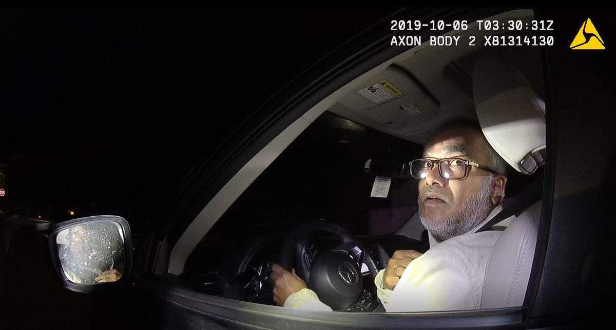 Former Cal Poly materials engineering lecturer Sarder Sadique is questioned during an Oct. 5, 2019, on-campus traffic stop by University police officers. The screenshot is from officer body camera footage.
