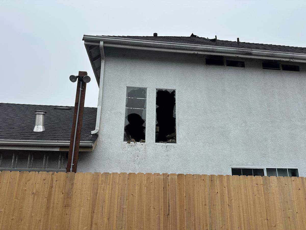 One person died and another was arrested after emergency crews responded to what police believed was an intentionally set house fire in Arroyo Grande on Oct. 14, 2024. This photo, taken Oct. 15, 2024, shows the back window witnesses say the suspect jumped out off in an attempt to flee the scene.
