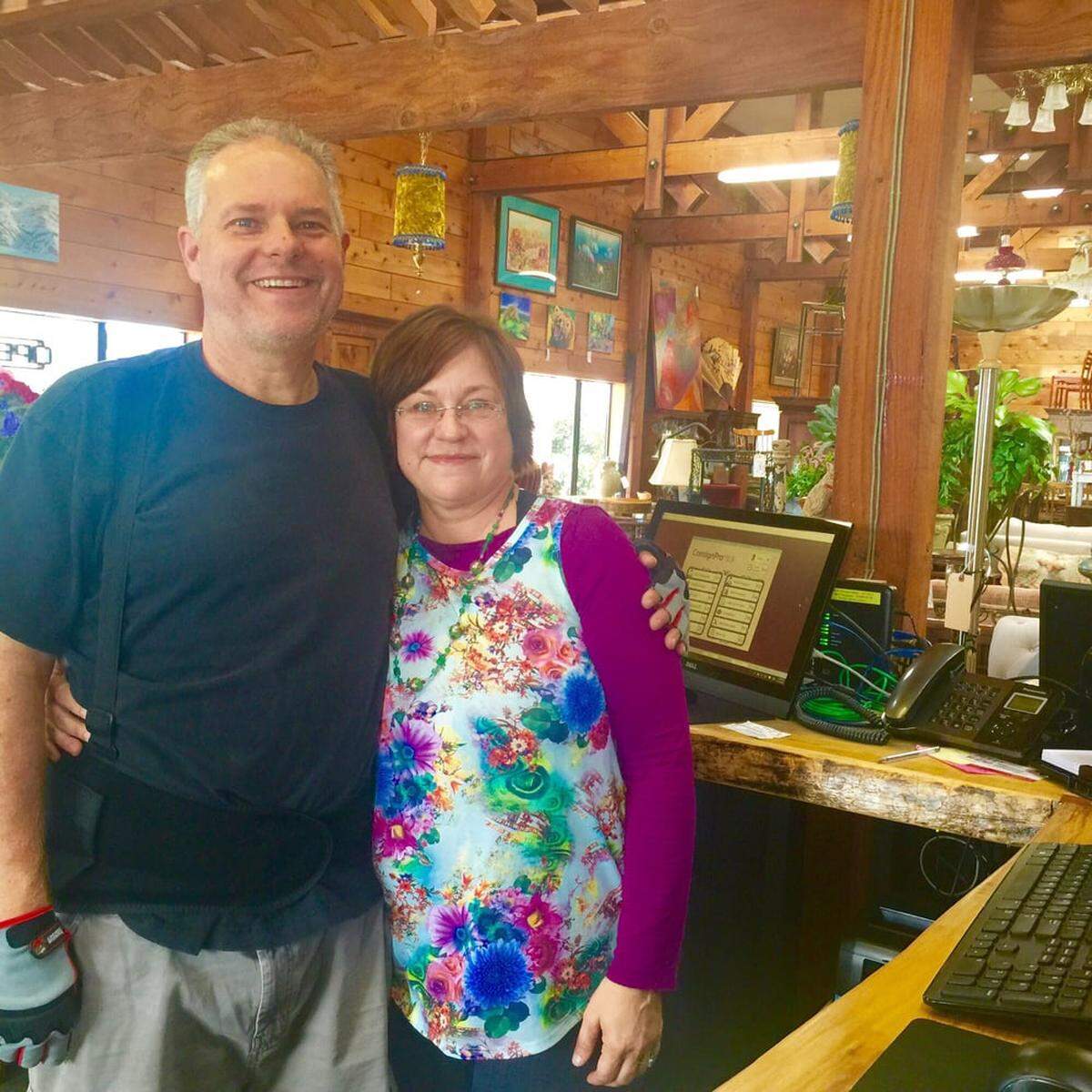 Phil Gardner, left, and Andrea Bowen-Gardner pose inside San Luis Obispo consignment shop Timeless Treasures, which has since closed.