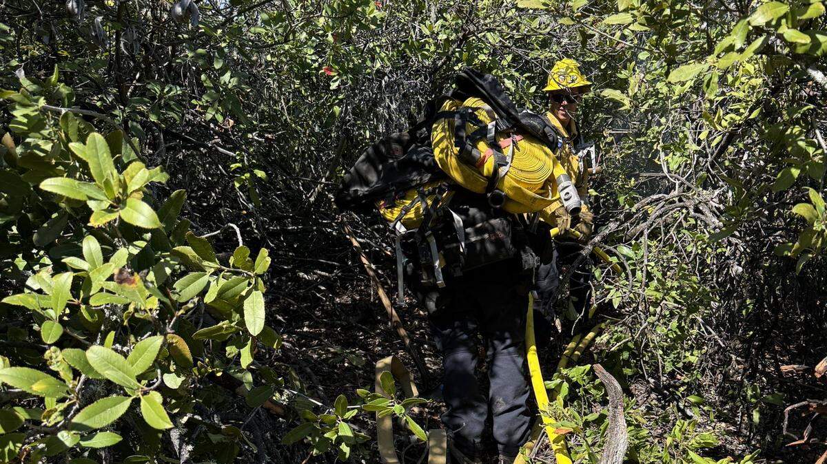 San Luis Obispo County Fire Department crews were working on a difficult-to-access vegetation fire in Paso Robles on March 28, 2026.
