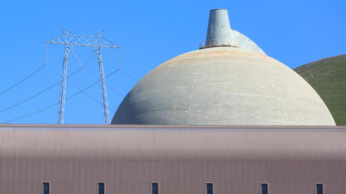 Pictured here is the Unit 2 containment dome, a transmission line and the turbine building of Diablo Canyon nuclear power plant owned by PG&E. The shutdown of the two units owned by PG&E is scheduled for 2024 and 2025.