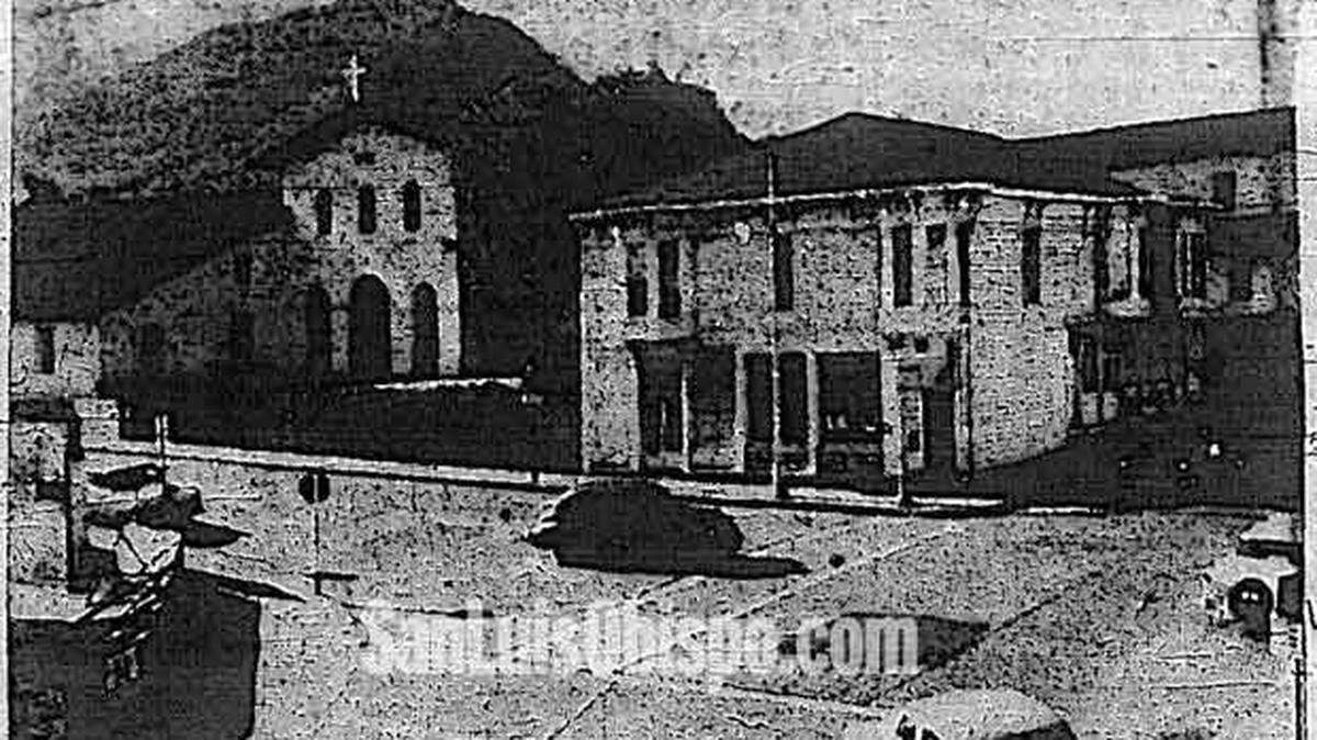 LEWIN BUILDING CONDEMNED...For many years an old landmark, adjoining the Old Mission church in San Luis Obispo, the Lewin building at the corner of Monterey and Chorro streets has ben ordered torn down. The old wooden-frame structure, an undertaker's parlor 65 years ago, is owned by Mrs. Hilda H. Howell of San Luis Obispo. (Telegram-Tribune photo)