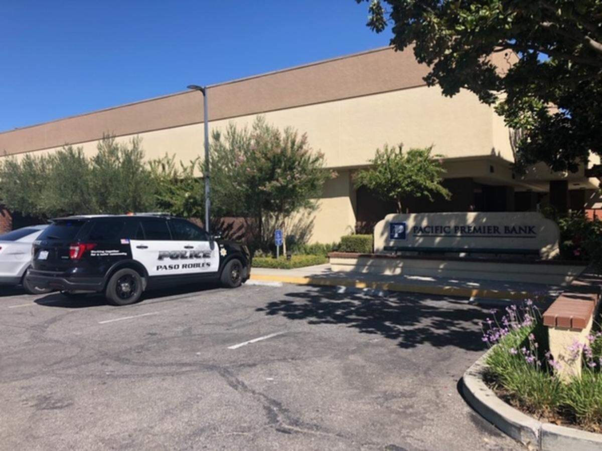 A police car is parked in front of Pacific Premier Bank on 12th Street in Paso Robles on Monday, Sept. 23, 2019. The bank was robbed early Monday afternoon.