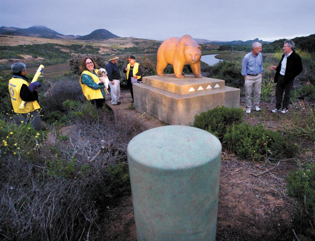 Members of the Rotary Club of Los Osos and supervisor Bruce Gibson are on hand for a lighting of the bear event on South Bay Boulevard in June 2012.