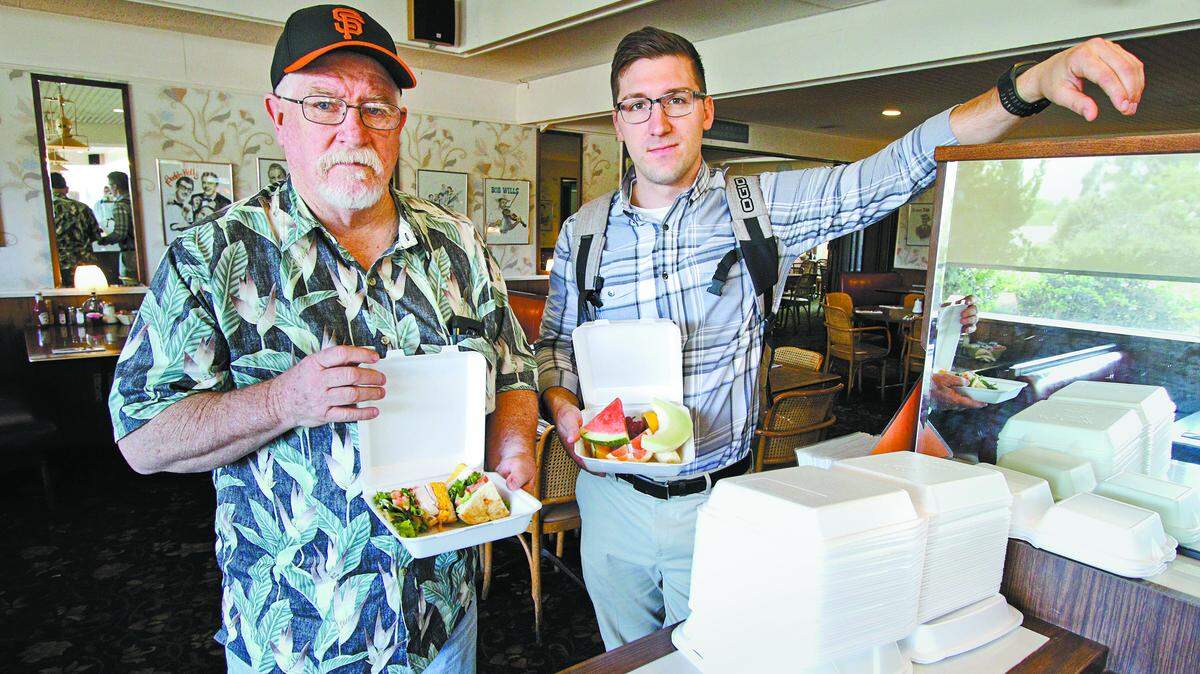 Terry Mullikin, left, and Jake Bitter with their leftover lunches packed into Styrofoam containers at Margie's Diner in San Luis Obispo, where owner Marjorie Johnson was concerned about a 2015 ordinance that banned the materials in city limits.