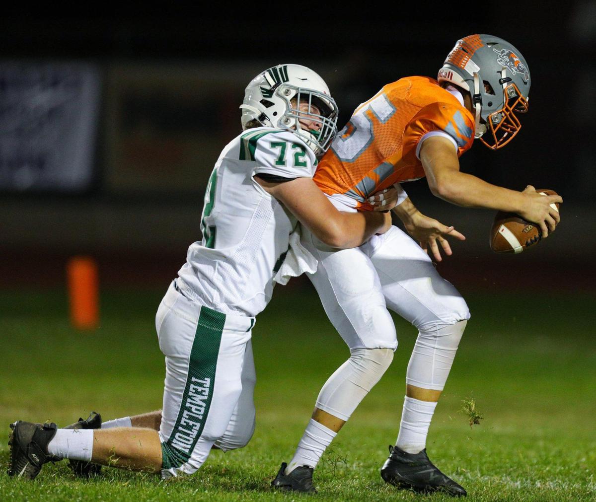 Aiden Wall sacks Kane Cooks. The Atascadero Greyhounds beat the Templeton Eagles 27-21. Atascadero high School hosted Templeton in Ocean League football on Oct. 7, 2022.
