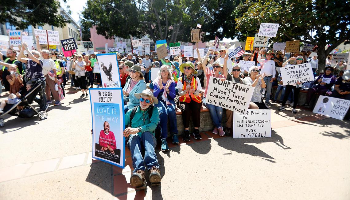 Thousands of people gather at San Luis Obispo Superior Court in California as part of the “Hands Off!” rally to protest President Donald Trump and his advisor Elon Musk.
