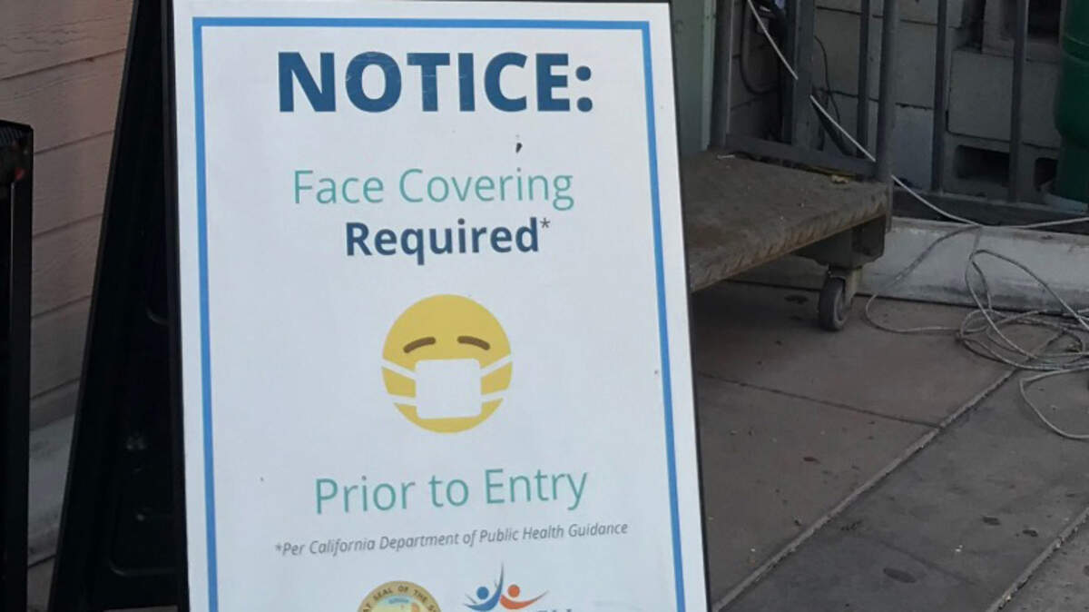 Signs posted at stores around San Luis Obispo County notify shoppers that masks are required to enter.