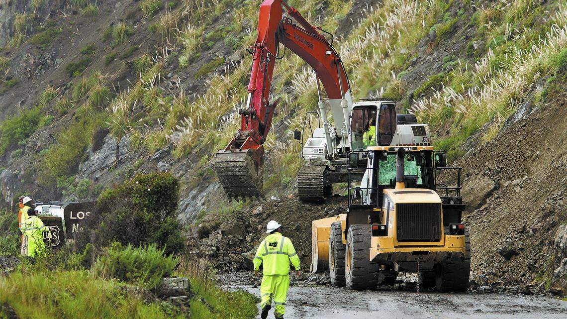 Caltrans worked to clear Highway 1 following this slide in March 2011 south of Limekiln State Park in Monterey County. A slide in the same area Tuesday closed the road again. Caltrans reopened the highway around middeay Wednesday.