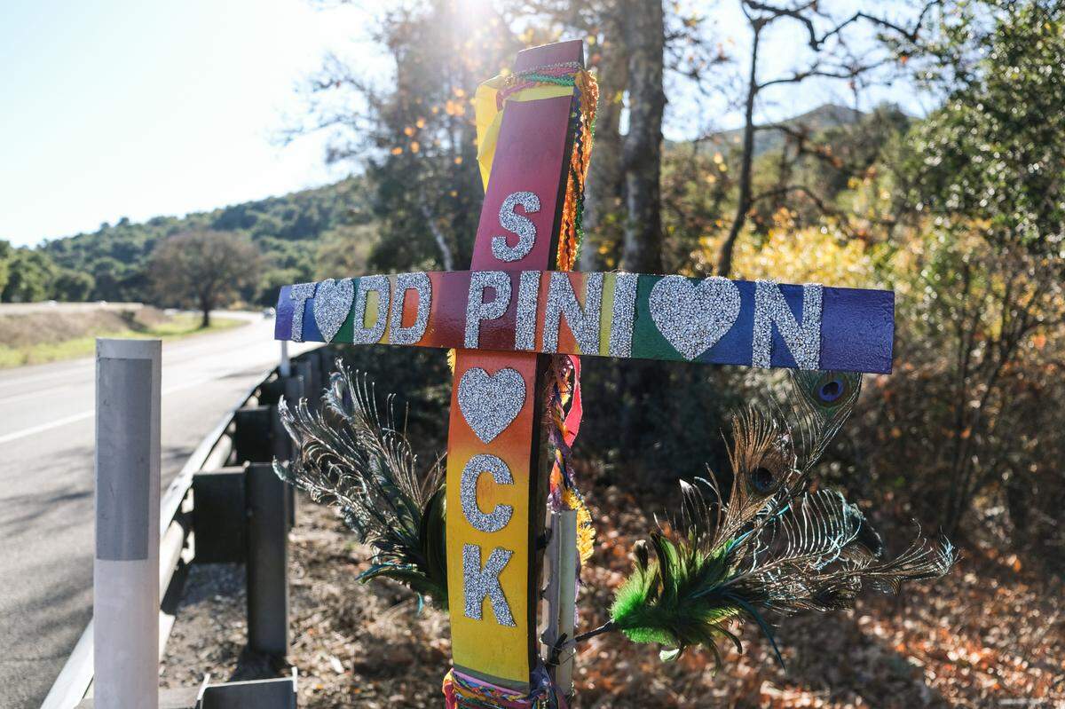 A memorial cross commemorating the life of Todd Pinion and his dog, Spock, located at Tassajara Creek Road and Highway 101 southbound in Santa Margarita pictured on Dec. 18, 2024. Pinion was reportedly murdered in an alleged hate crime on Oct. 23, 2024. His dog, Spock, was found dead at the bottom of the Cuesta Grade while Pinion’s body was found in a rural area on Tassajara Creek Road.