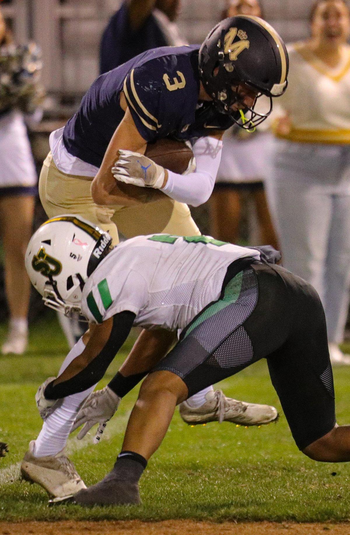 Tyler Garrett fights for yardage as Mission Prep fell to St. Joseph 49-21 on Oct. 28, 2022, in the last game of the regular season, giving the Knights the Mountain League football championship.
