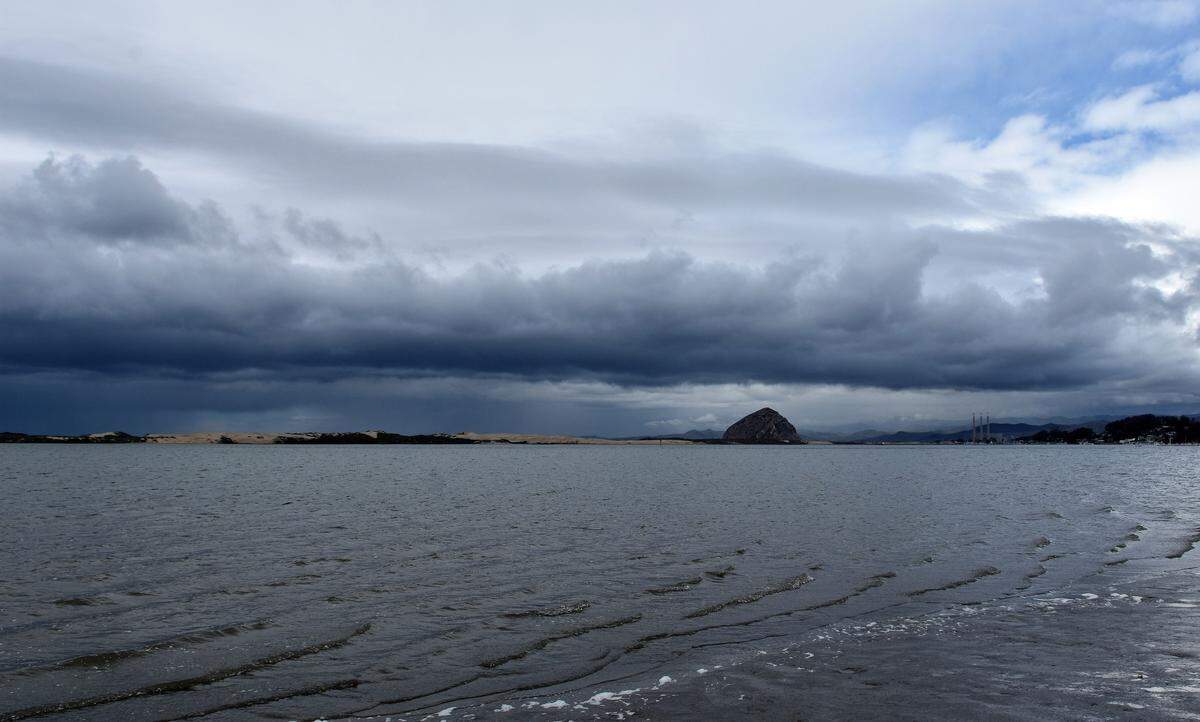 Rain clouds hover over Morro Bay.