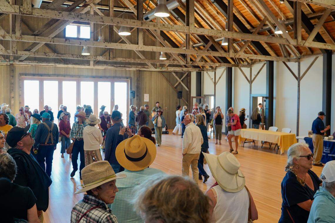 Community members step inside Cayucos Landing for the first time in several years at the building’s grand re-opening on Monday, Aug. 25, 2025. More than 200 people turned out to see the new Cayucos Landing, which underwent an $11 million rehabilitation project between 2022 and 2025.