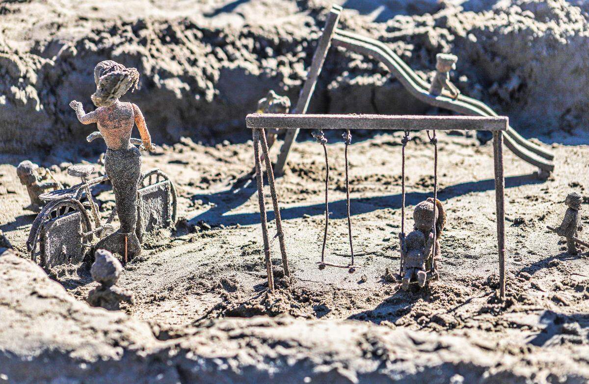 A detailed sand sculpture featuring a playground scene was one of 24 entries in Cayucos’ Fourth of July sandcastle-building contest on July 4, 2022.