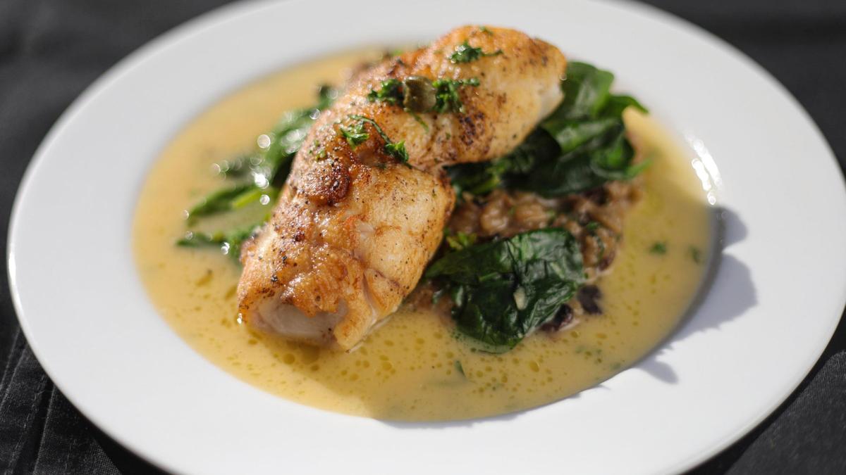John McDevitt opened Paso Backdoor Cucina for carry out or delivery only. This is pan seared petrale sole with wild mushroom risotto wilted spinach, caper herb beurre blanc on Feb. 2, 2024.