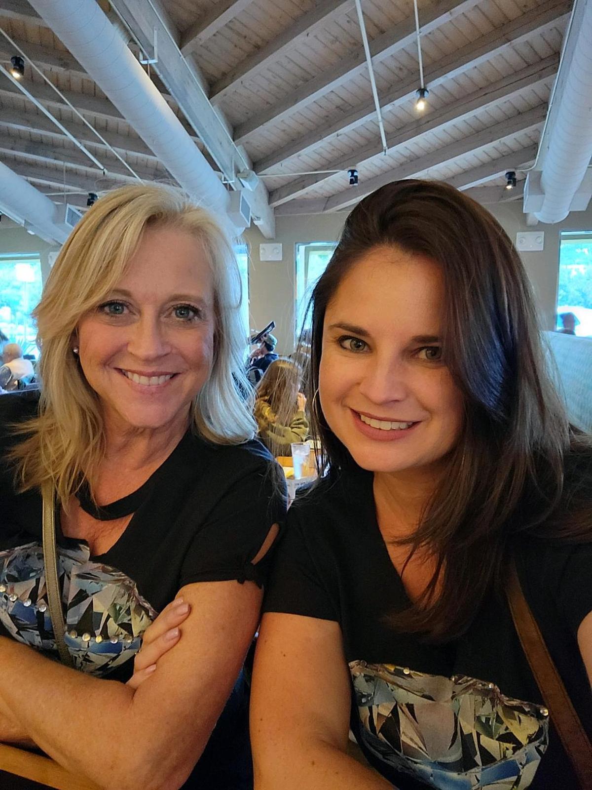 Pam McConal, left, and Farren Francisco, right, both graduated from Cuesta College in the 57th commencement ceremony.