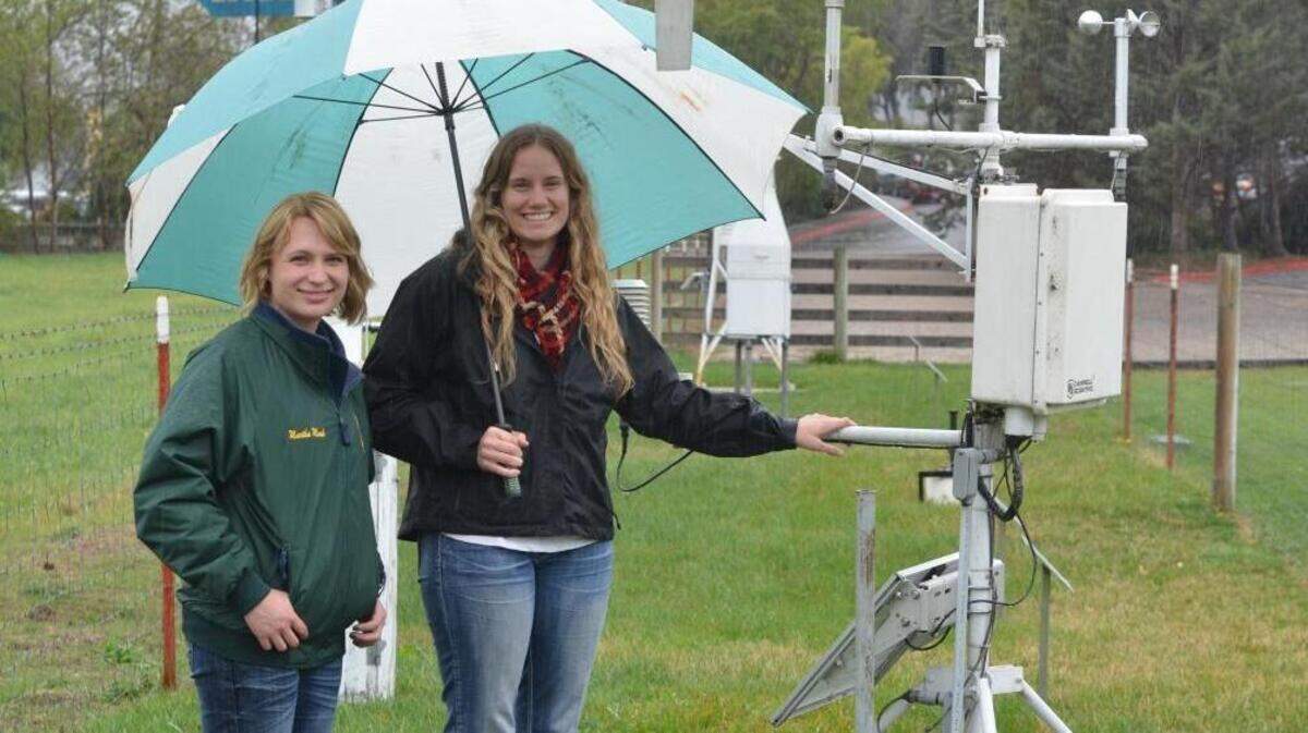 Martha Moak and Hilary Olsen are the keepers of the official Cal Poly rain gauge.
