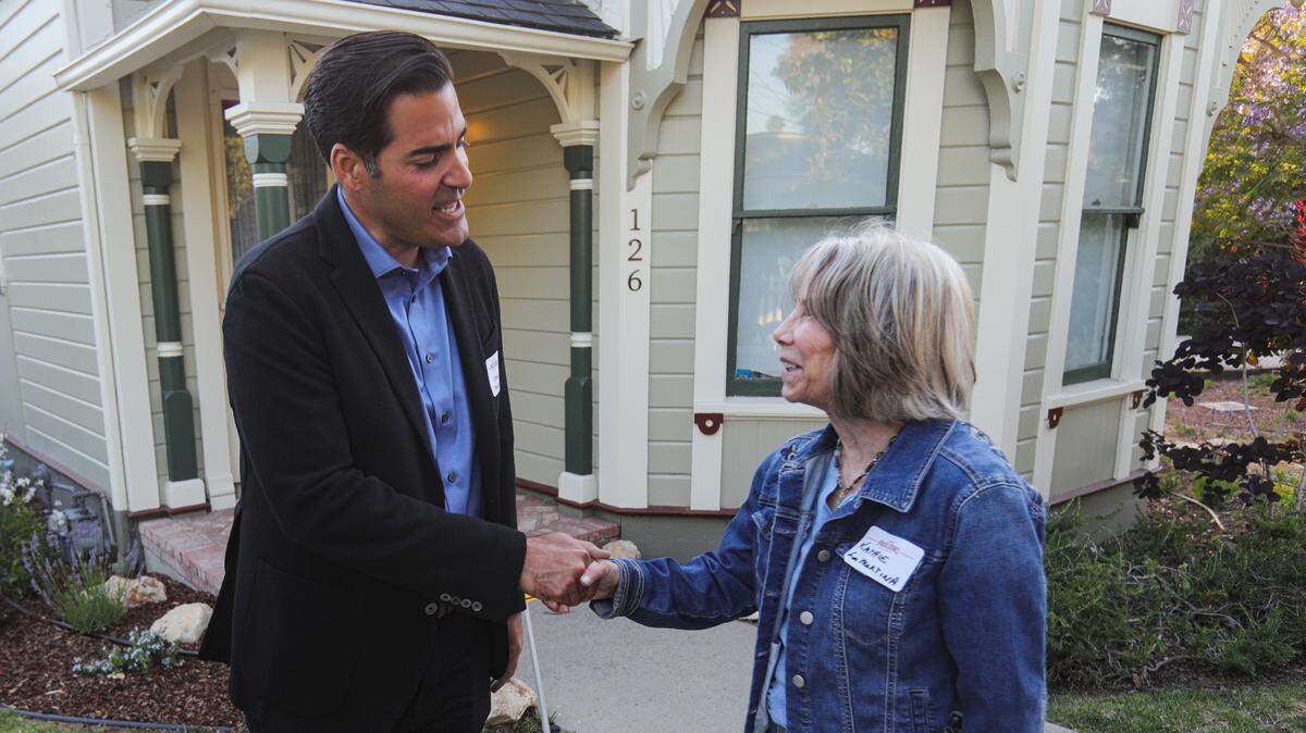 Jimmy Paulding, who’s running to represent District 4 on the San Luis Obispo County Board of Supervisors, greets Kathie LaMartin at an election night party at Heritage House in Arroyo Grande on Tuesday, June 7, 2022