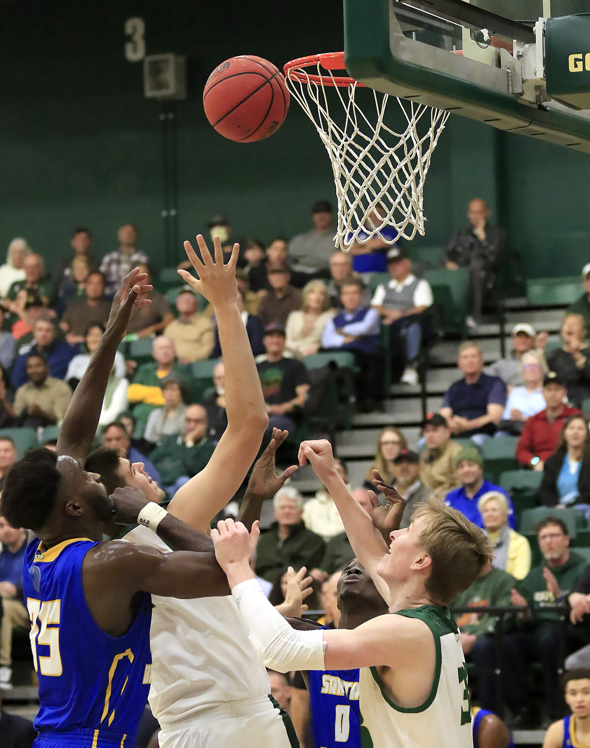 Cal Poly fights for a rebound during a 63-45 loss to UC Santa Barbara at Mott Athletics Center on Jan. 8, 2020.