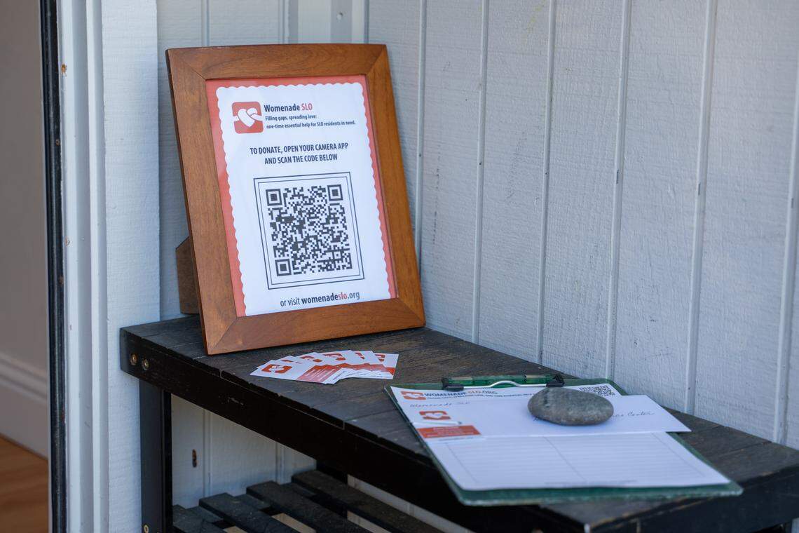 Signup information for Womenade SLO sits outside of executive director Elaine Stewart's home in San Luis Obispo on Saturday, Dec. 6, 2025. Womenade SLO was founded in April 2025 as a successor to the Womenade organization that served San Luis Obispo County from 2003 to 2019.