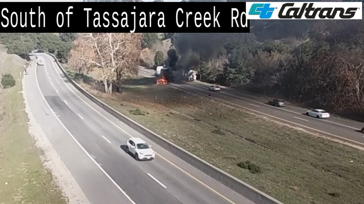 A vehicle was on fire, spitting black smoke and blocking the No. 1 northbound lane on Highway 101 on Dec. 16, 2025.
