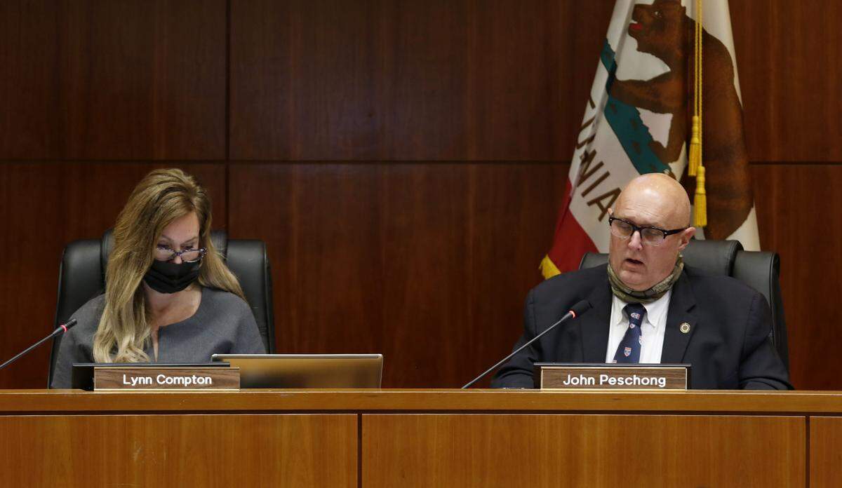 Supervisor Lynn Compton listens while John Peschong comments during the San Luis Obispo County Board of Supervisors redistricting meeting on Nov. 30, 2021. Peschong continues to falsely claim supervisors cannot consider political data when drawing redistricting maps, even to ensure the final product is nonpartisan.
