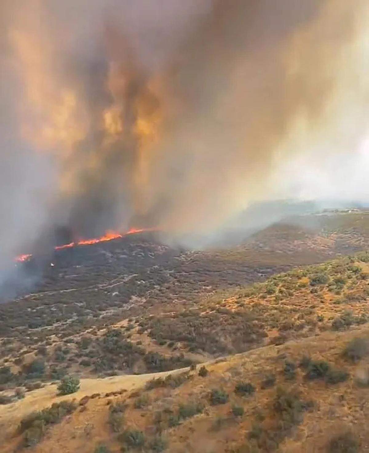 Smoke rises from the Plant Fire burning in the Cuyama Valley in northern Santa Barbara County on Saturday, Aug. 19, 2023.