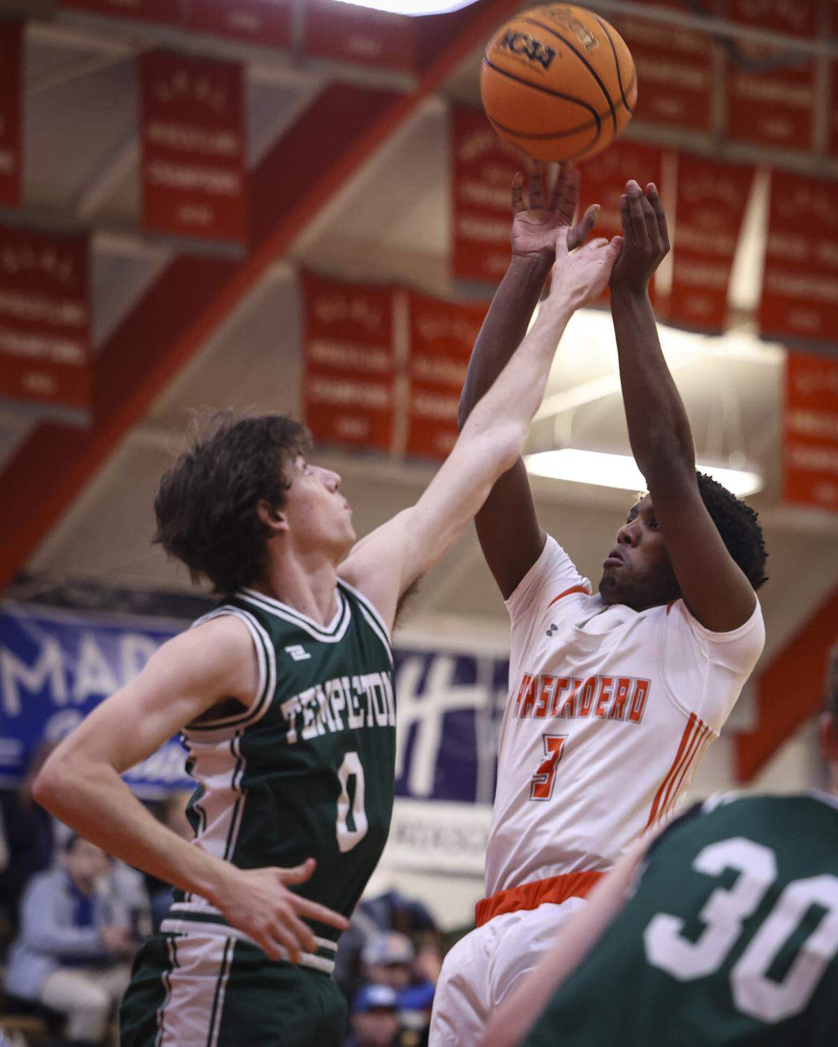 Ethan Tonini defends against a shot by Shea Buckley. Atascadero beat Templeton High School 76-55 in a basketball game on Jan. 20, 2026.