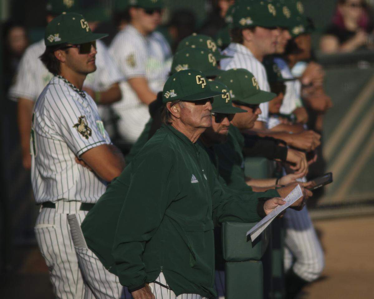 Head Coach Larry Lee watches Griffin Naess pitch. Cal Poly beat Long Beach State 11-3 on May 14, 2026. 