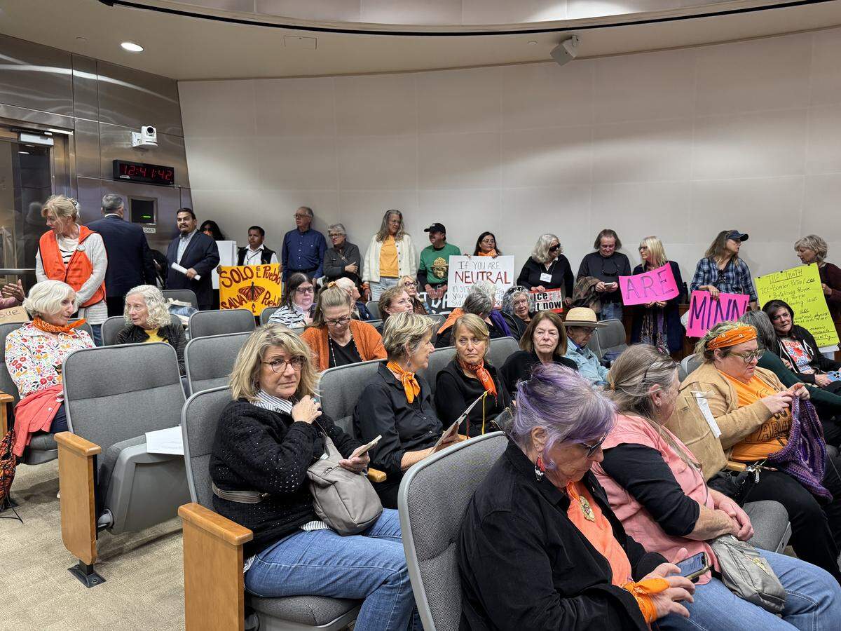 Protesters packed the San Luis Obispo County Board of Supervisors meeting on Jan. 27, 2026, ahead of a forum with the Sheriff’s Office on local ICE activity data.