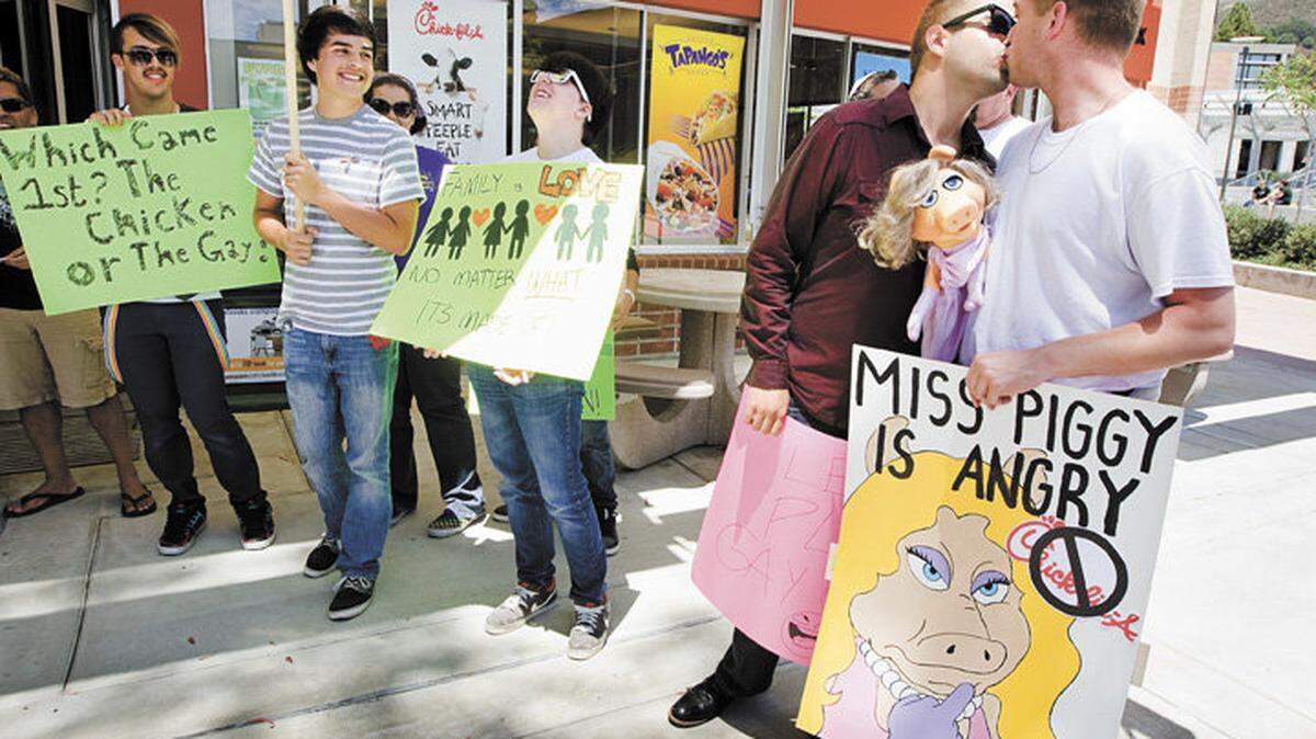 Gay rights groups protested outside the Chick-fil-A restaurant at Cal Poly in 2012. The  fast-food outlet recently came under renewed scrutiny when the Academic Senate urged it be banned from campus.