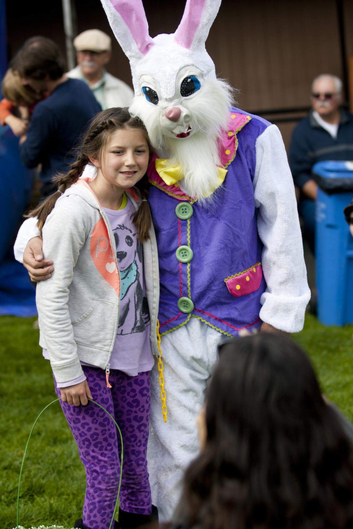 Hundreds of kids and parents joined in on the fun activities and an Easter egg hunt at the Los Osos Community Center in 2013. Julie Bundy, of Dana Point, takes a photo of her daughter, Haley, 9 with the Easter Bunny.