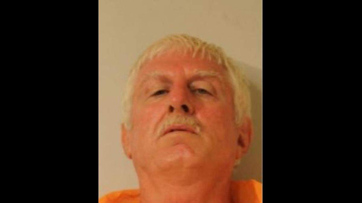 Police arrested 61-year-old John Hubbard, a resident of Leilani Estates, after he allegedly assaulted and shot at a man who had come to the neighborhood to check on his destroyed home.