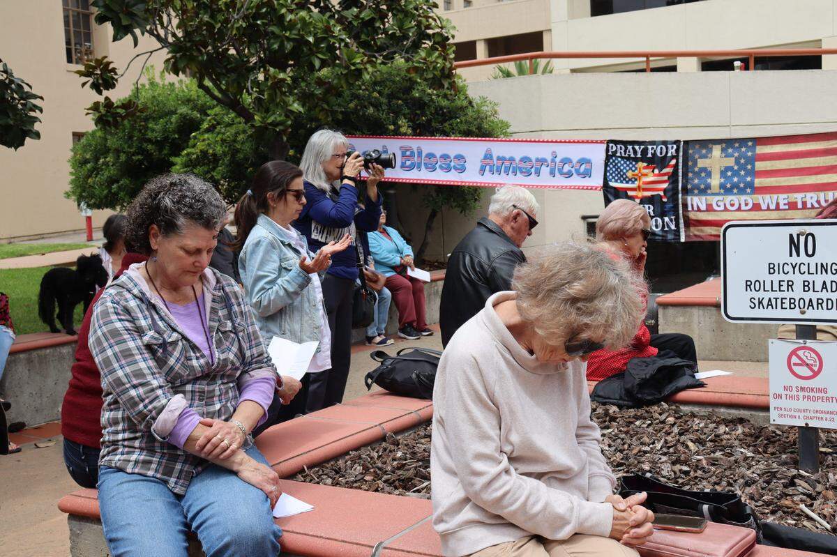 Over a hundred people gathered on the steps of the San Luis Obispo Superior Courthouse to celebrate the National Day of Prayer on Thursday, May 1, 2025, an event led by District Attorney Dan Dow.
