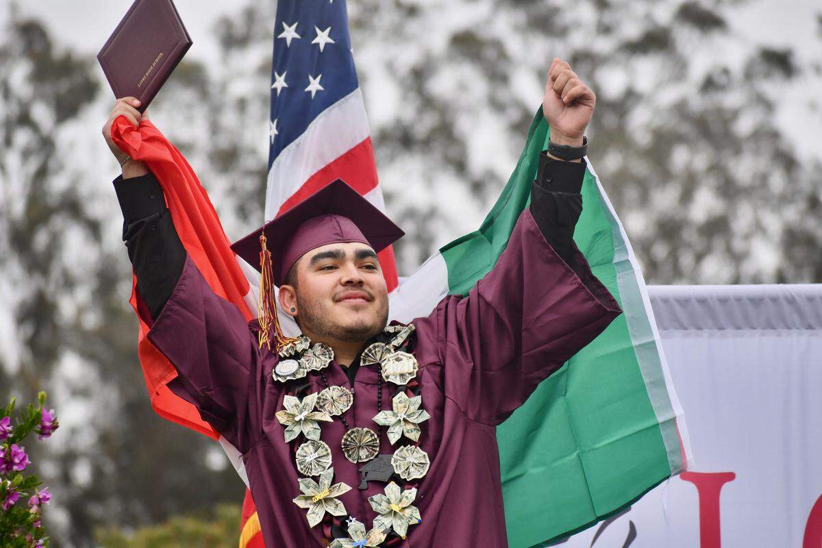Brayan Terriquez celebrates his graduation from Lopez Continuation High School on Wednesday.