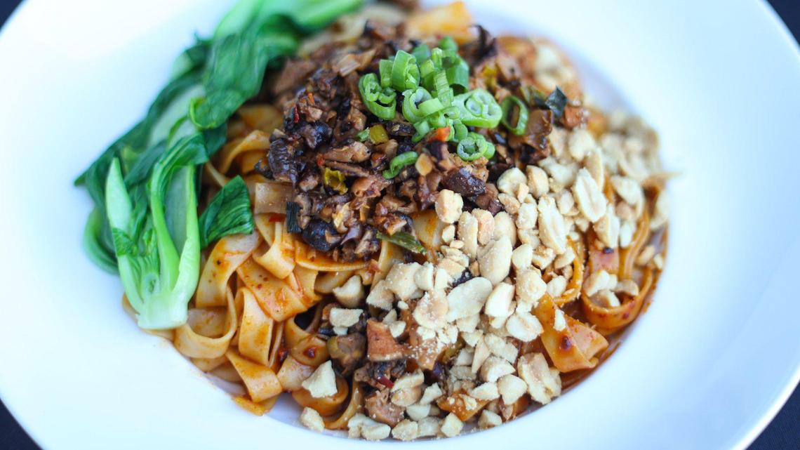 DanDan Noodles feature Etto noodles, ground shiitake, bok choy with chili sesame sauce. Garrett Morris of Sichuan Kitchen SLO hosted a pop up dinner at Hotel San Luis Obispo’s High Bar on Oct. 17, 2023.
