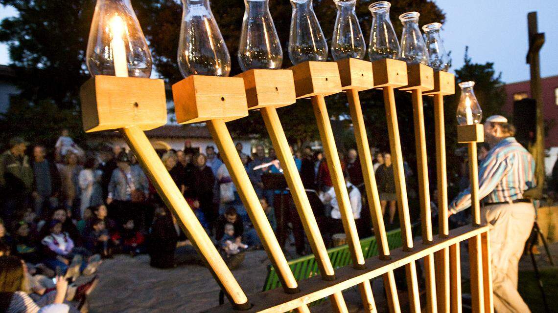 The giant menorah in front of Mission San Luis Obispo was lighted for the first night of Hanukkah on Wednesday.