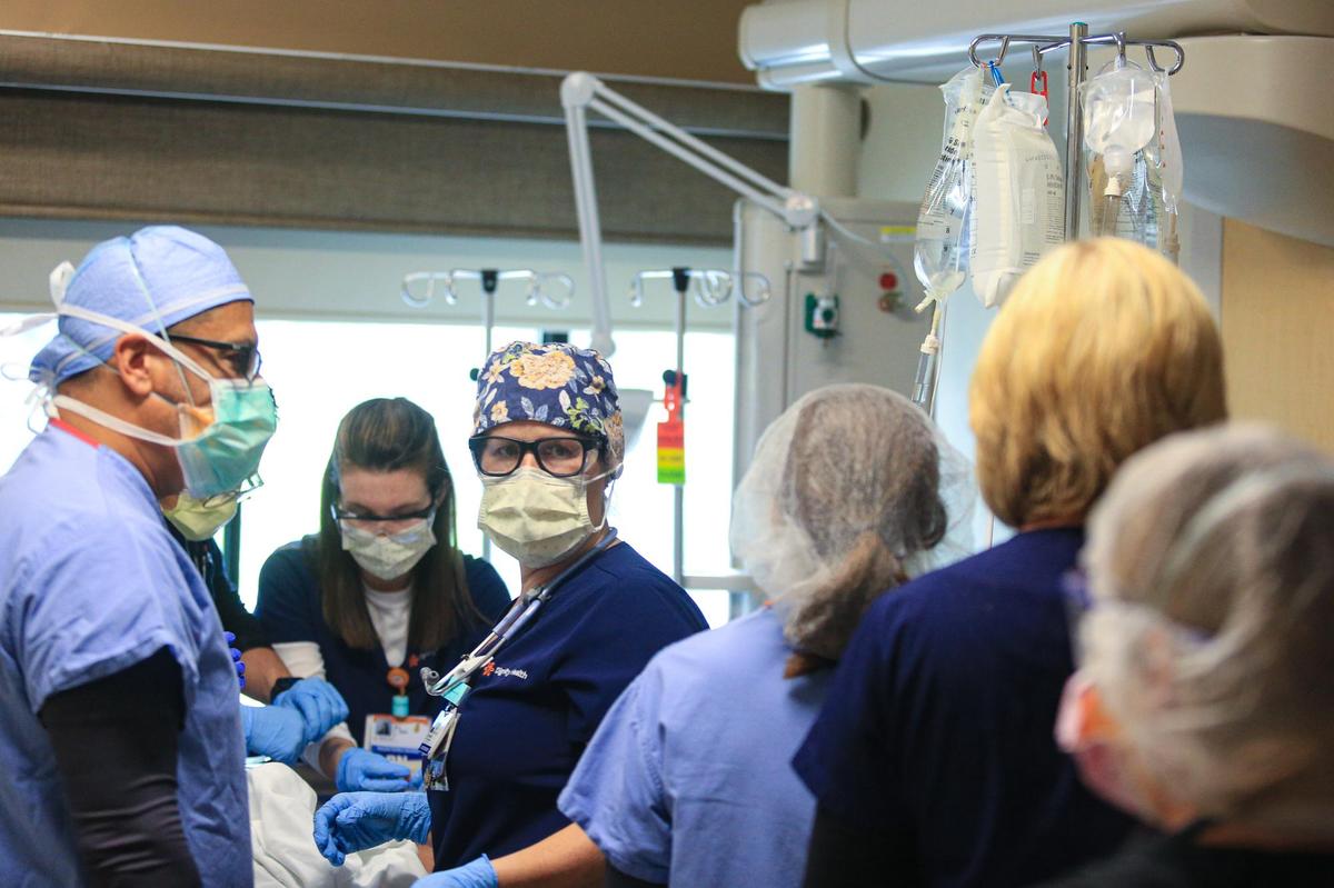 Doctors and nurses at the French Hospital Medical Center Intensive Care Unit handle patient care during the COVID-19 pandemic in March.