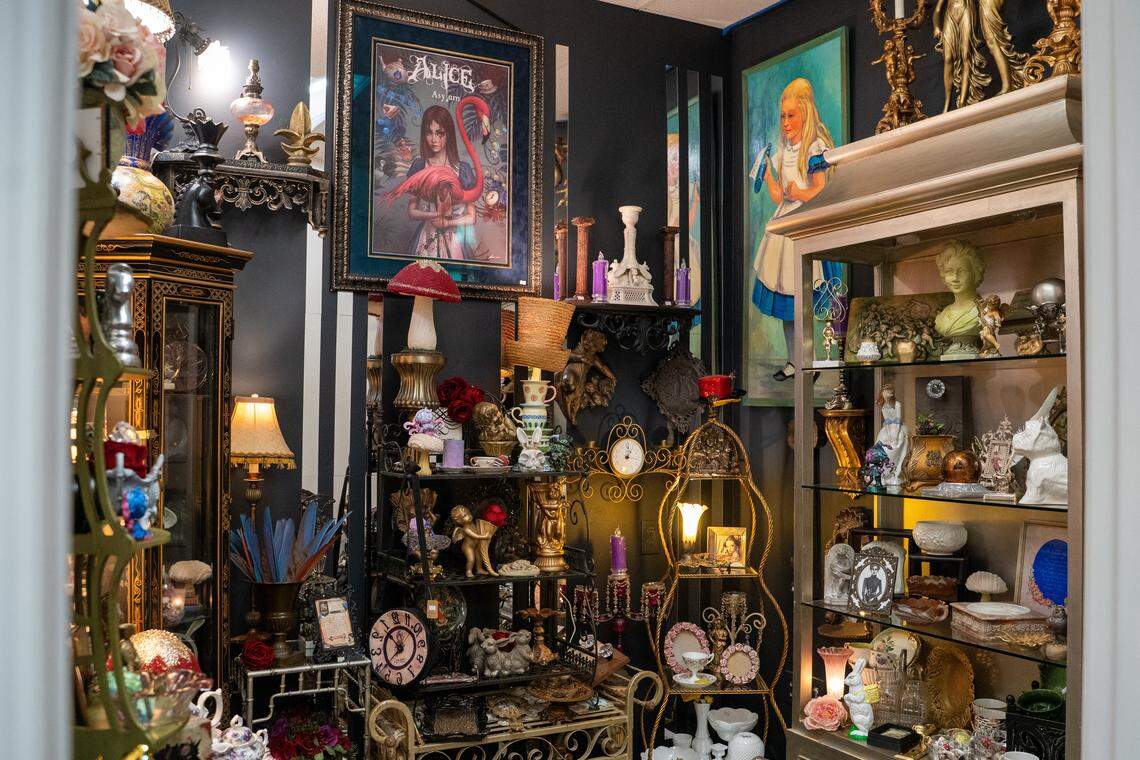 A room themed around Alice in Wonderland and dark gothic antiques is part of the new home of Odd Fellows Antiques Emporium in Grover Beach, pictured here on Tuesday, Nov. 11, 2025. The antique store moved to 1527 W Grand Ave. in August after its 983 W Grand Ave. home was sold to new owners.