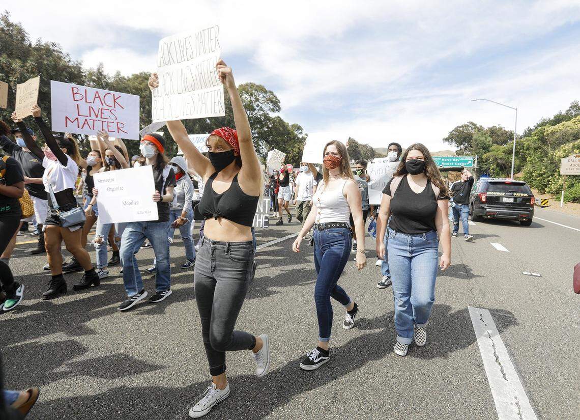 Black Lives Matter protesters march on Highway 101 at Santa Rosa Street on June 1, 2020.
