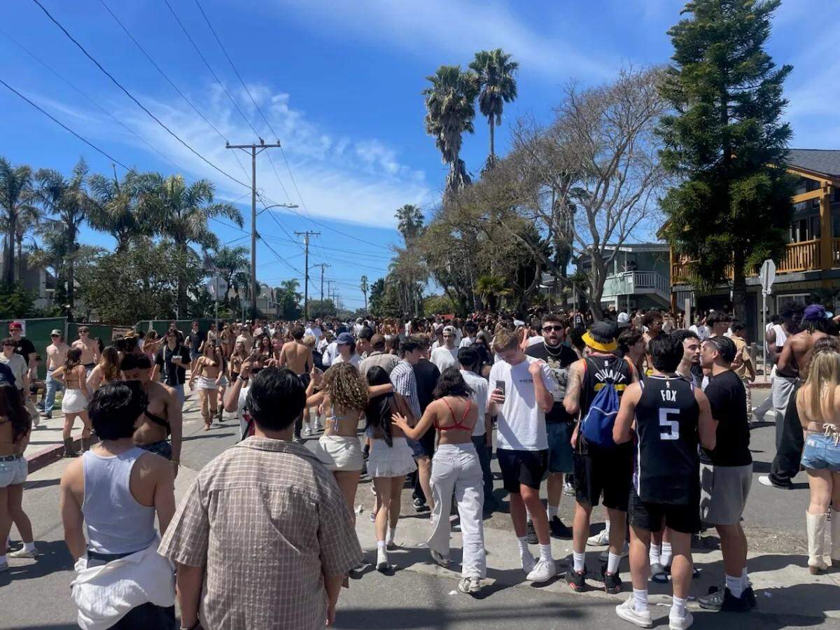 A large crowd gathered midday to revel in Deltopia, an annual tradition in Isla Vista after Spring Break.