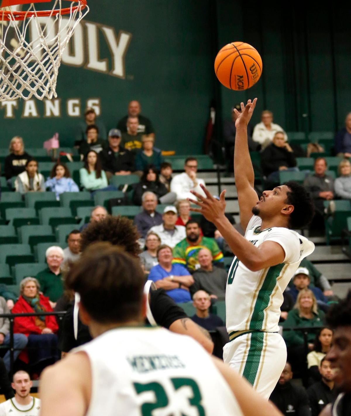 Jarred Hyder goes for a basket. Cal Poly beat Hawaii 79-63 in a men’s basketball game at Mott Athletic Center in San Luis Obispo on Thursday, Feb. 6, 2025.