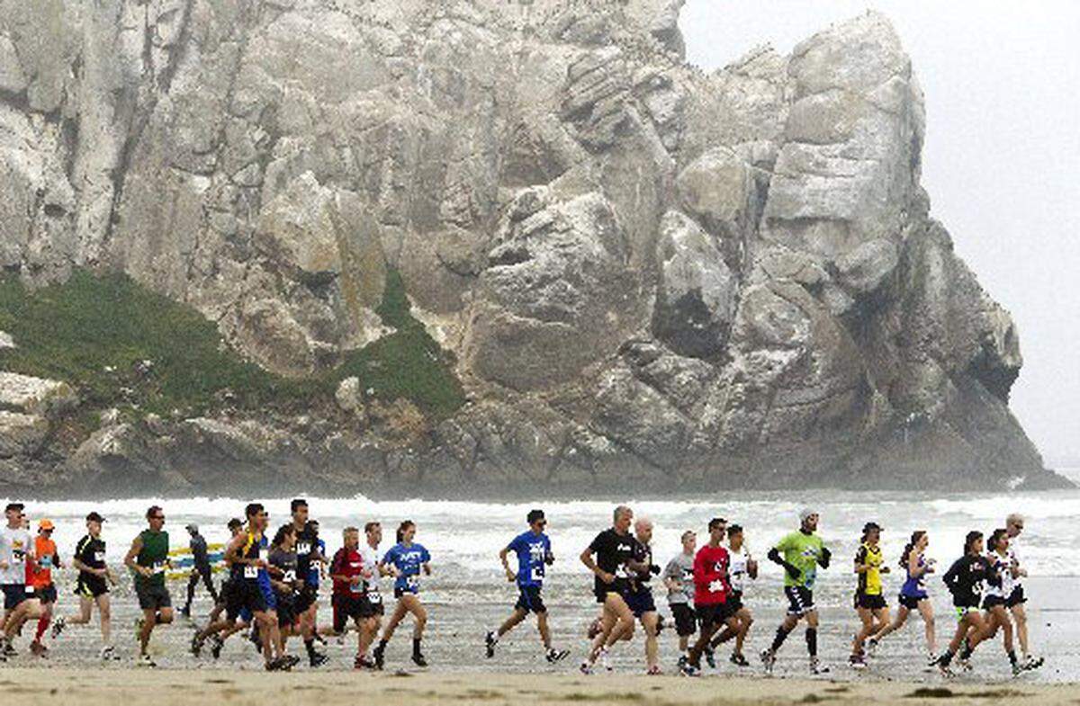 A file photo of the Brian Waterbury Memorial 10K run from the Morro Bay Rock to the Cayucos Pier. The annual event is still on, but participants will do solo runs in their neighborhood or on a treadmill.