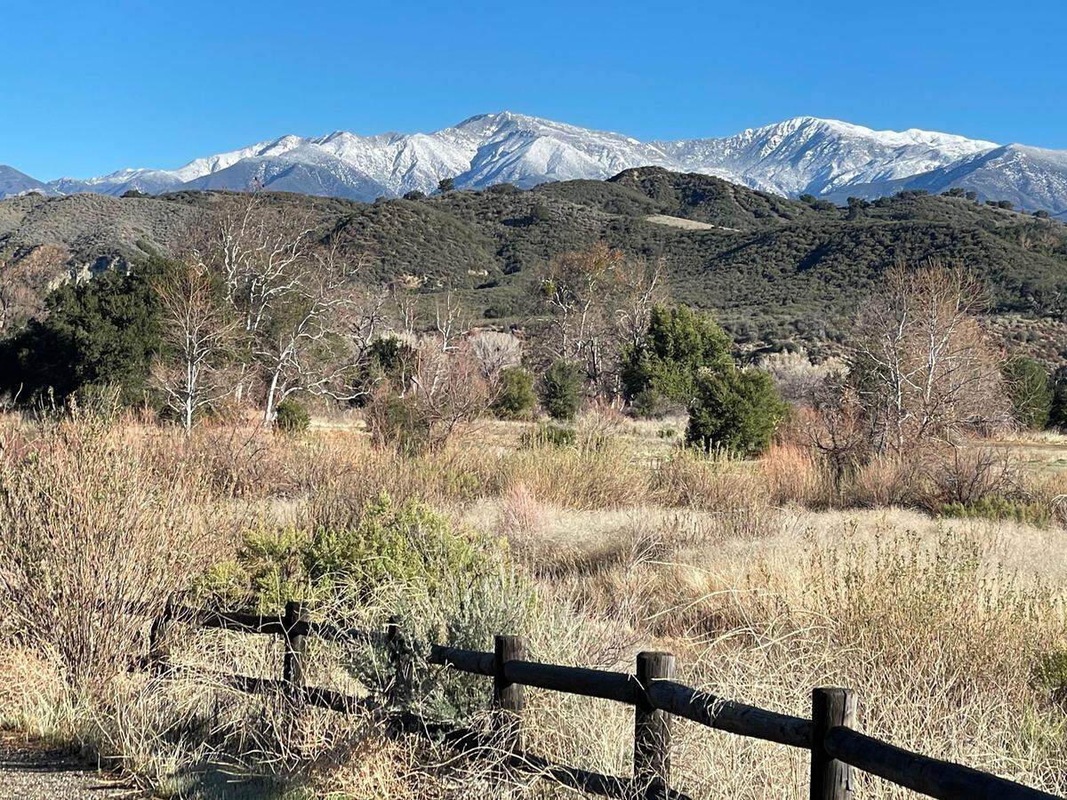 The soil remained dry near the Santa Ynez River, with the San Rafael Mountains in the distance.