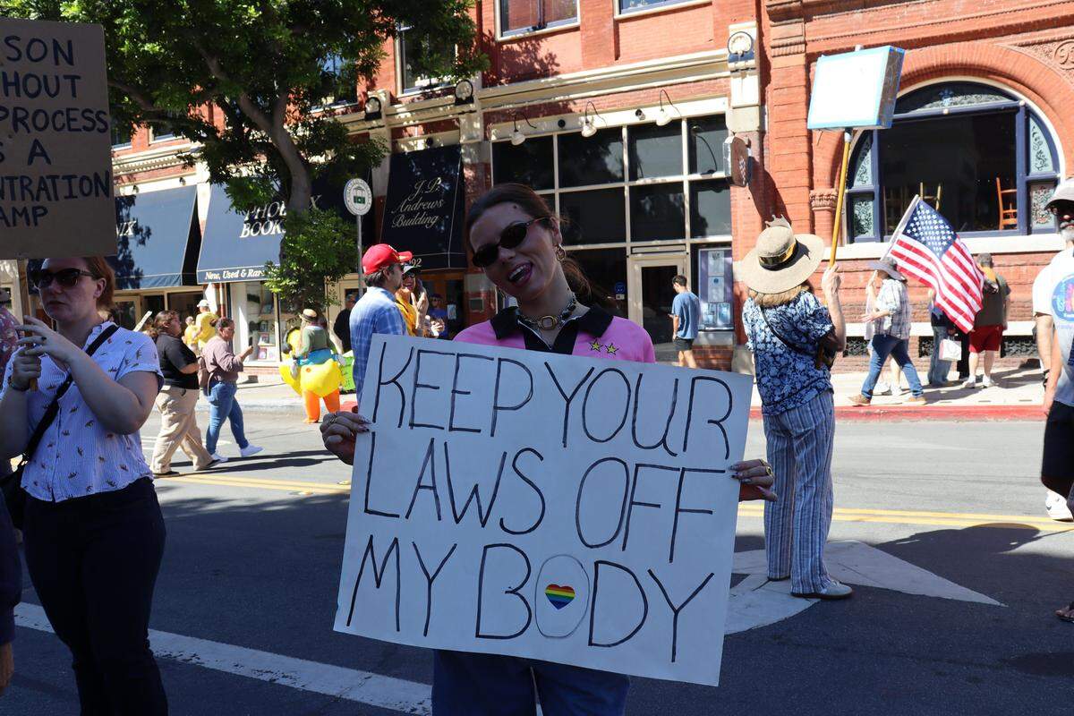 Thousands of people attended the No Kings rally in downtown San Luis Obispo to protest the Trump administration and support Prop. 50 on Oct. 18, 2025.